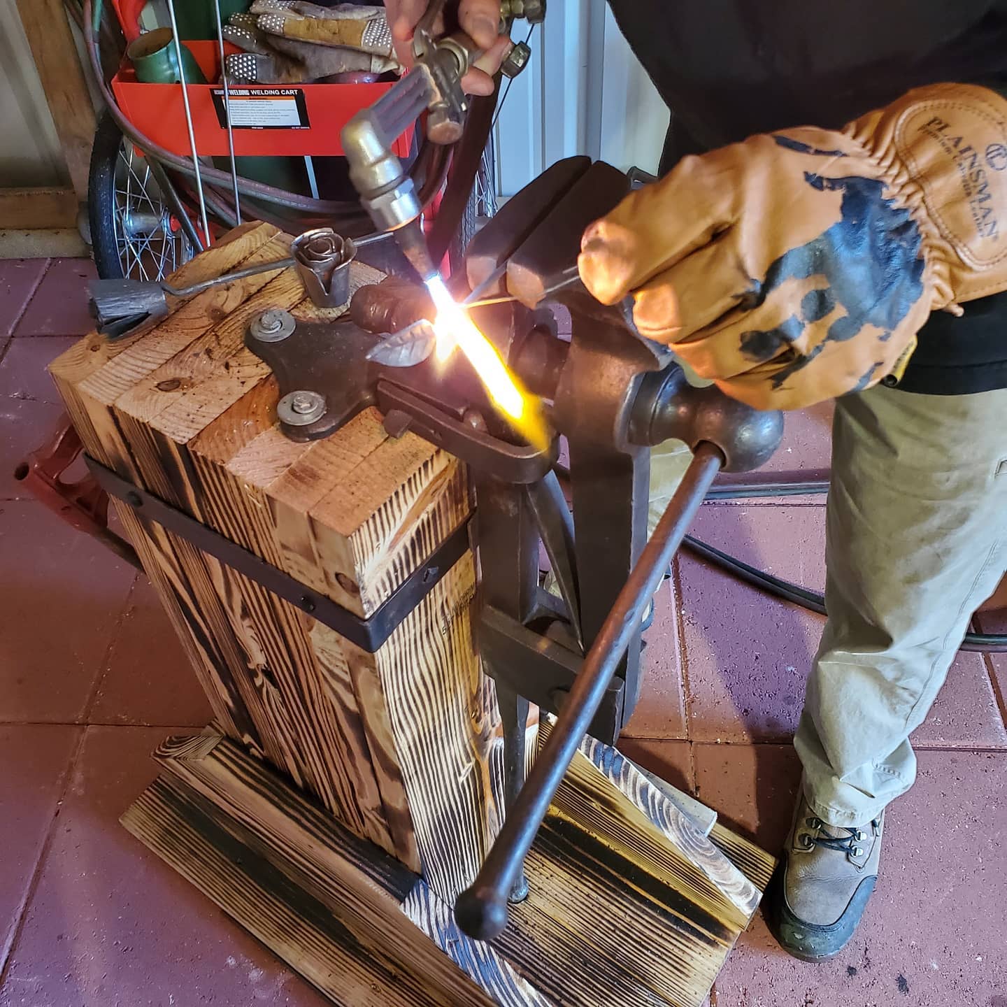 man using welding torch